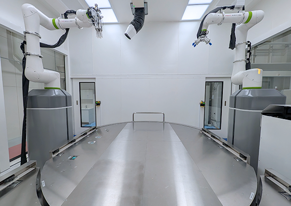 Photo of the scrap material collection process of the dry decoration system installed at the Zama Technical Center.